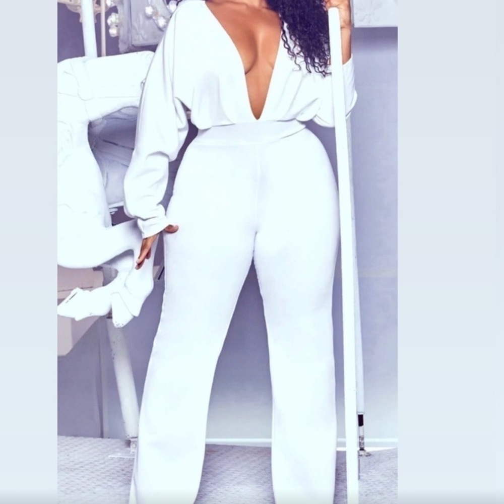 White jumpsuit , never worn still in original package!!